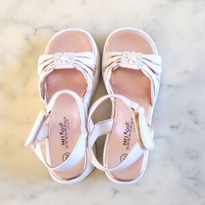Melrose Kids White Wedge Sandals with Embroidered Pearl Flower and 2.75" Heels.